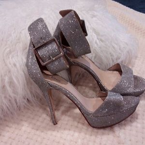 Like new Bebe silver glitter stilettos /heels